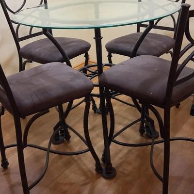 Counter-Height Glass Top Dining Table with Four Metal Chairs