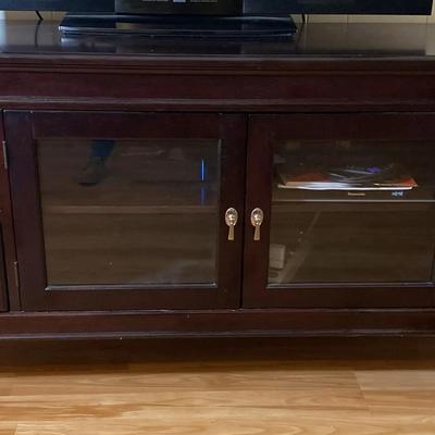 Wooden Media Console with Glass Doors and Storage Drawers