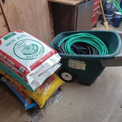 Garden Lot – Yard-About Cart, Hoses, and Bags of Top Soil