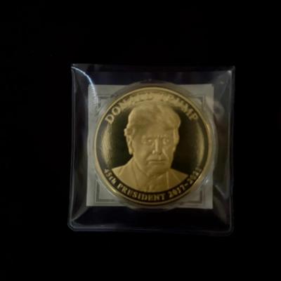 Lot 430: Donald Trump 45th President Commemorative Gold-Tone Coin – Statue of Liberty Reverse, Encas
