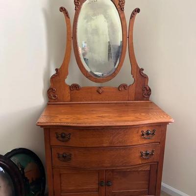 Lot 300: Antique Oak Dresser with Mirror — Carved Detail and Bowed Drawers