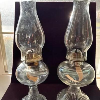 Lot 137:  Pair of Antique Clear Glass Oil Lamps
