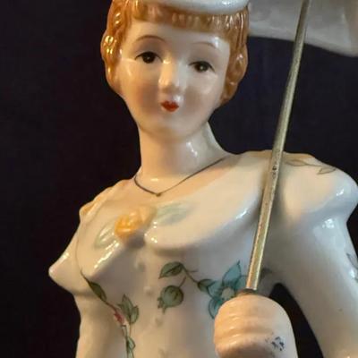 Lot 505: Victorian Lady with Parasol Porcelain Figurine