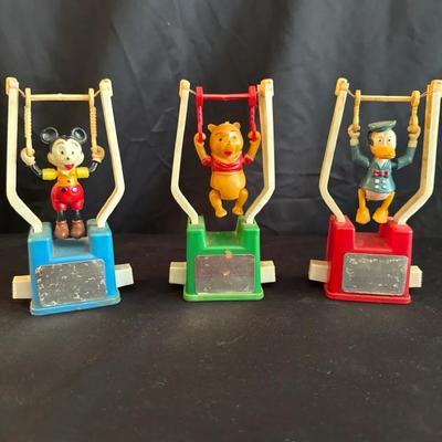 Lot 512: Set of 3 Working Vintage Disney Wind-Up Gymnast Toys – Mickey, Pooh & Donald