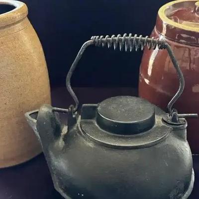 Lot 116:  Antique Stoneware Crocks and Cast Iron Kettle Trio