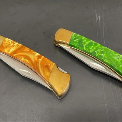 Two Decorative Buck-110 Knives Green & Gold