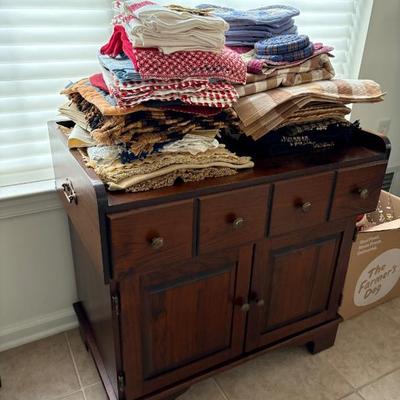 Sale Photo Thumbnail #2: Medium wood cabinet table. Great storage, in very good condition! $50.00 or best offer.