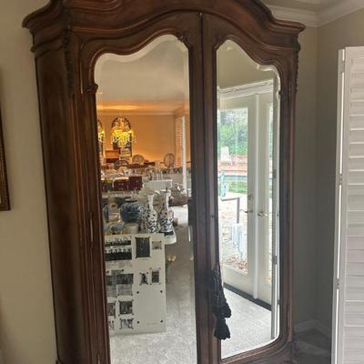 Mirrored armoire