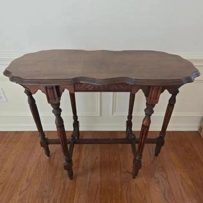 English Tudor-style carved Wood console table