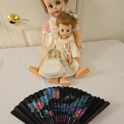 Vintage 1950s Madame Alexander doll with earrings, original dress 