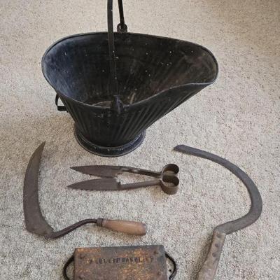 Primitive tools...... sickles, sheep sheers, coal bucket