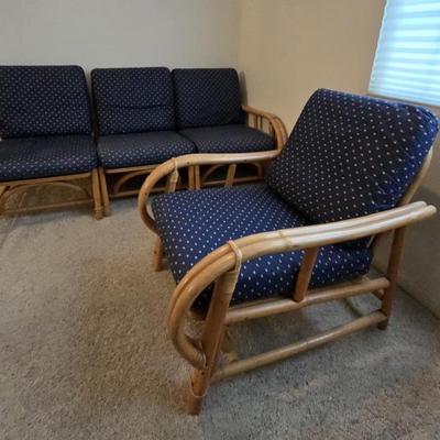 Sale Photo Thumbnail #31: Available for early sale!
Vintage, mid-century Ficks Reed Co rattan set. The couch is 3 separate pieces. Each of the 4 frames still have the original Fics Reed Co. tag on them. 
The cushions have been replaced. Minor wear other than the surface flaw that 