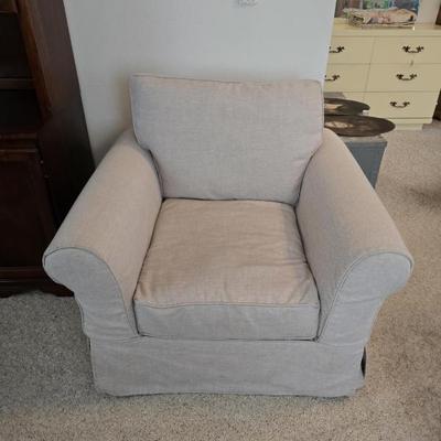 Pottery Barn large swivel chair. Extra red cover included. 