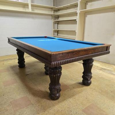 Sale Photo Thumbnail #17: Available for early sale!
You must bring help to carry out of basement and load yourself. The legs do come off. 
Antique Indianapolis Combination Table....
Billiards, dining, pool.
The original cabinet and contents shown come with this. 
Not perfect, but 