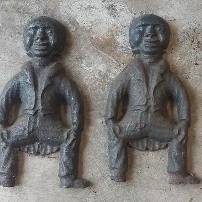 Pair of Cast Iron Figures – Folk Art Style (c. 1920s–1930s)
