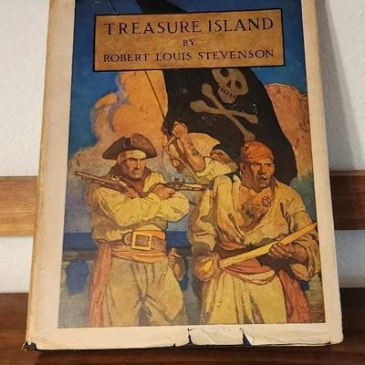 “Treasure Island” by Robert Louis Stevenson (Illustrated Hardcover, Early 1900s)