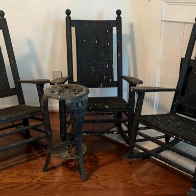 Three Wooden Rocking Chairs with Woven Seats and Wrought Iron Plant Stand