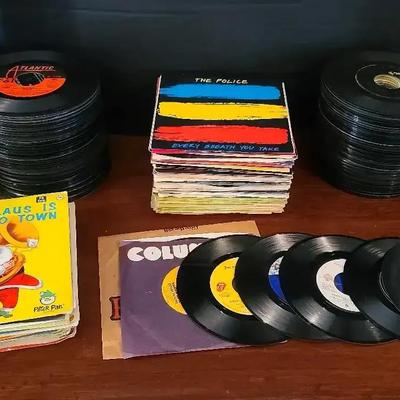 45 RPM Vinyl Record Collection Featuring The Police, John Lennon, Prince & The Rolling Stones