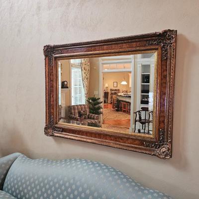 Large ornate framed beveled wall mirror