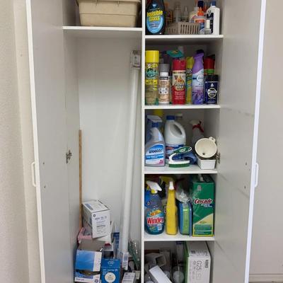 White Storage Cabinet with Cleaning Supplies & Lightbulbs