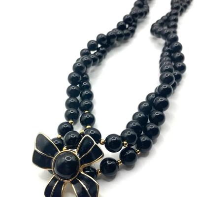 Vintage Two-Strand Black Beaded Necklace With A Gold And Black Bow Accent