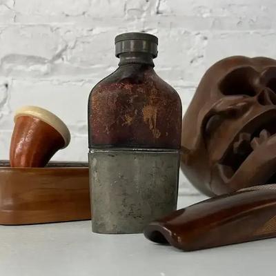 Hand Carved Wooden Skull with Calabash Pipe and Stand, Book Safe, Leather-Wrapped Pewter Flask, More
