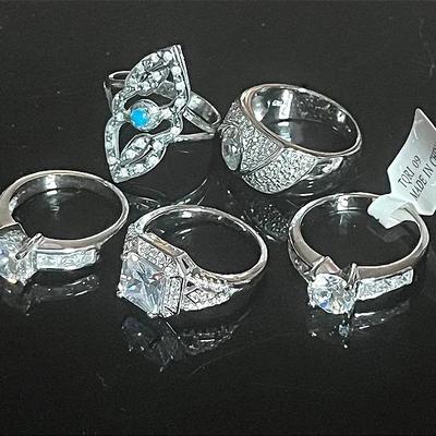 Silvertone CZ Rings, One Marked