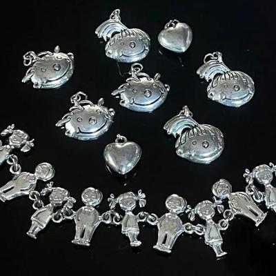 Sterling Silver .925 Children Charm Bracelet with 8 Silvertone Child Faces and Heart Charms 