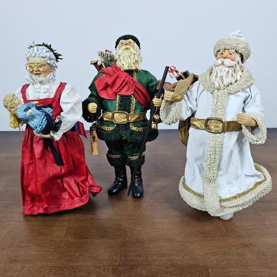 Lot #98 - Set of 3 Vintage 1988 Clothtique by Possible Dreams Christmas Figures – Mrs. Claus with Doll, Santas