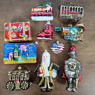 Lot #55 - Lot of 10 Hand-Blown Glass Ornaments – Travel, & Adventure Themes (New York, Oklahoma, Knight, Judge, Heart +)