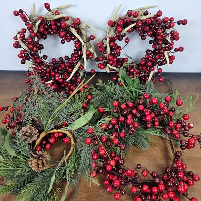 Lot #103 - Holiday Berry & Pine Candle Wreath Lot – Red Berries, Antler Rings, and Evergreen Accents