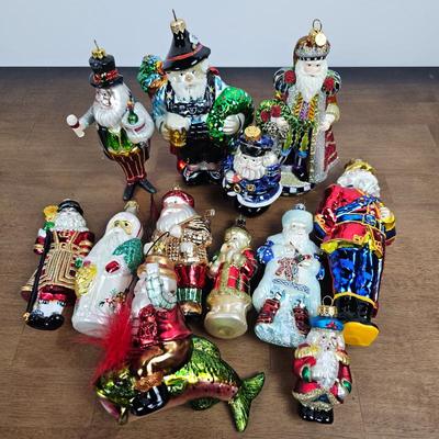 Lot #65 - Lot of 12 Glass Christmas Ornaments – Santas, Father Christmas Figures, Fisherman, and Nutcracker