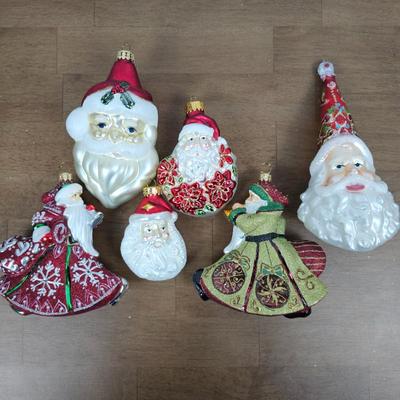 Lot #63 - Lot of 6 Glass Santa Claus Ornaments – Vintage Style Holiday Figures with Glitter Details