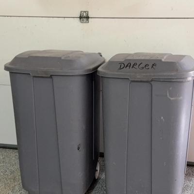 Two Garbage Cans with Lids