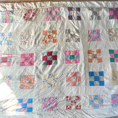 Quilt with Nine Patch Block Pattern