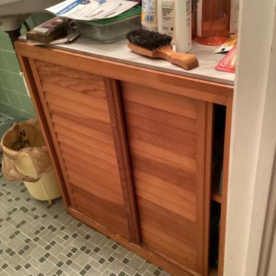Sale Photo Thumbnail #131: Bathroom vanity with louvered sliding doors