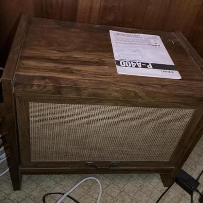 Sale Photo Thumbnail #126: Mcm wood cabinet with cane webbing on front and sliding door
