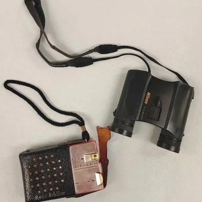 Retro Handheld Radio And Nikon Binoculars 