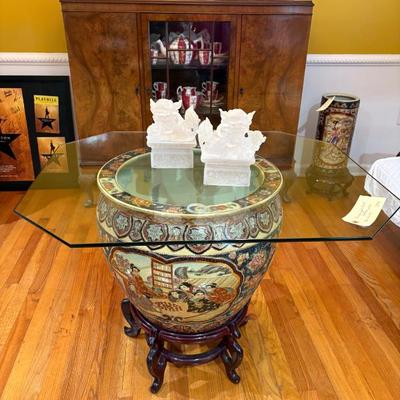 Sale Photo Thumbnail #118: Asian fishbowl and glass table $299
32 X 36"
