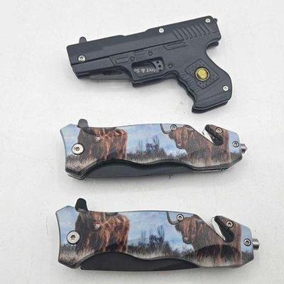 2208 • (2) snake eye pocket knifes & (1) pistol knife