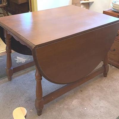 Dining Room  Table With Folding Leaves