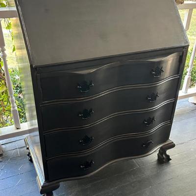 Vintage dovetailed secretary with ball in claw feet. 