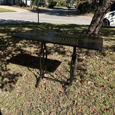 Sale Photo Thumbnail #37: Hand painted repurposed iron sewing machine base console table. Measures 42 inches wide x 21 inches deep x 29 inches tall. 