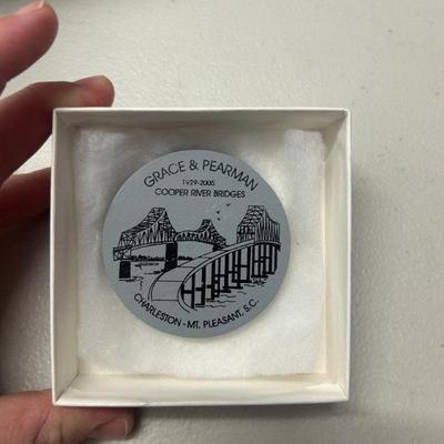 Sale Photo Thumbnail #124: Reclaimed steel medallion from original Cooper River Bridges. Signed. 