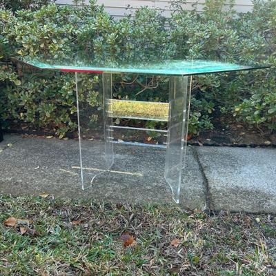 Sale Photo Thumbnail #52: Vintage 1970s Lucite base and heavy glass top table. Measures 48 inches for the glass top. 