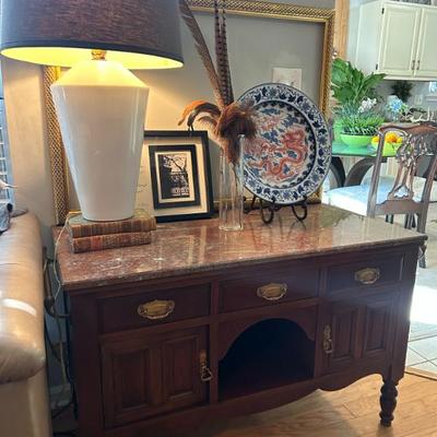 Sale Photo Thumbnail #56: Lovely antique marble top kitchen sideboard with original heavy brass hardware.  Measures 42 inches wide x 27 inches tall x 21 inches deep. 