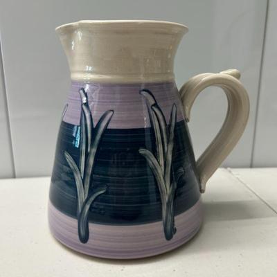 Sale Photo Thumbnail #235: Vintage hand made pottery pitcher signed by the potter. 