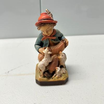 Sale Photo Thumbnail #193: Hand carved and painted German child figurine. 