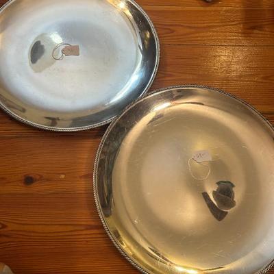 Sale Photo Thumbnail #23: Two large circular silver plated trays. 