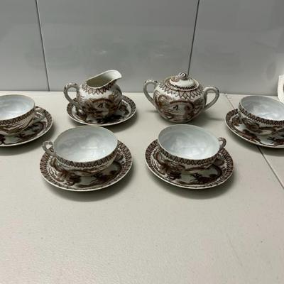 Sale Photo Thumbnail #113: Imperial Japanese antique porcelain teacup set. 4 cups and 5 saucers. 